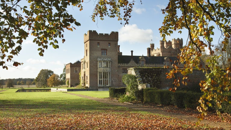 The south and east fronts at Oxburgh Hall, Norfolk, in autumn